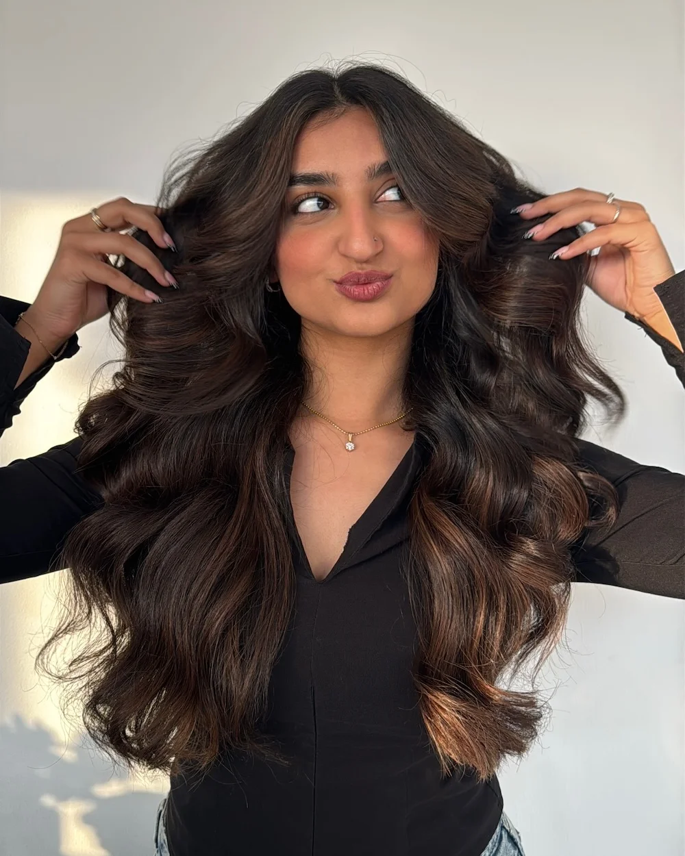 Curly Hair Cuts & Coloring 5 - top hair salons in UAE Which Hair Colours Are Dubai’s Women Loving This Season?